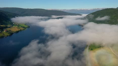 aerial footage beautiful nature norway over the clouds.