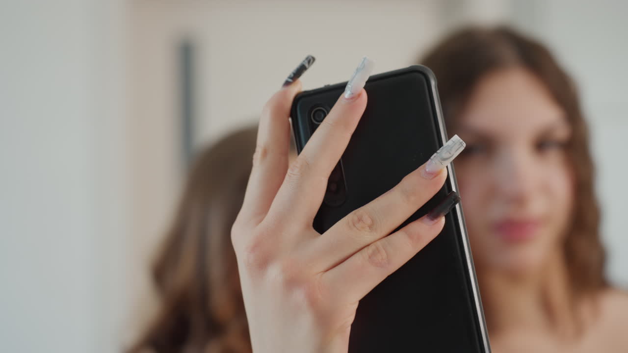 Bright Apartment With Fashionable Nails, Close Shot Of Woman With Trendy Nails In Cozy Space, Fashionable Woman Capturing Selfie In Welllit Apartment With Accessories And Blurred Background