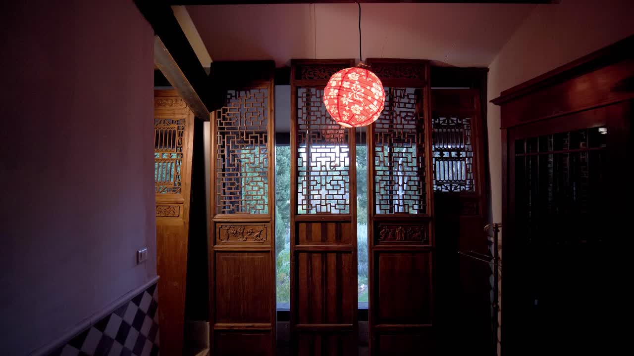 dark chinese room with wooden wall