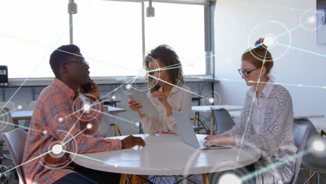 network connections animation over diverse business people working in office