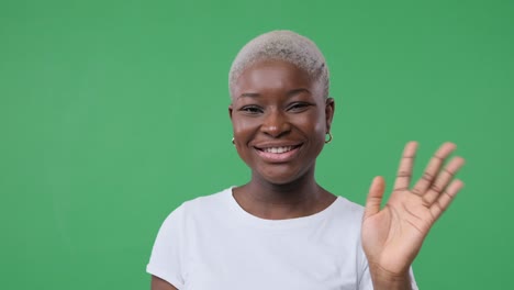 happy woman waving hand and greeting hello