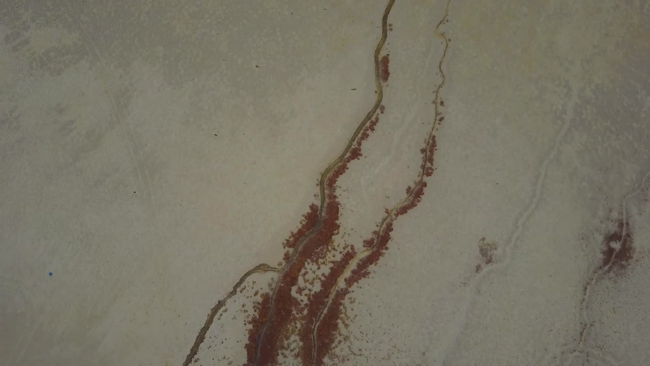 Cinematic shots at dusk on a foggy day next to a beach in Arifjan, Kuwait. Scenes do show natural formations that occured over the years.