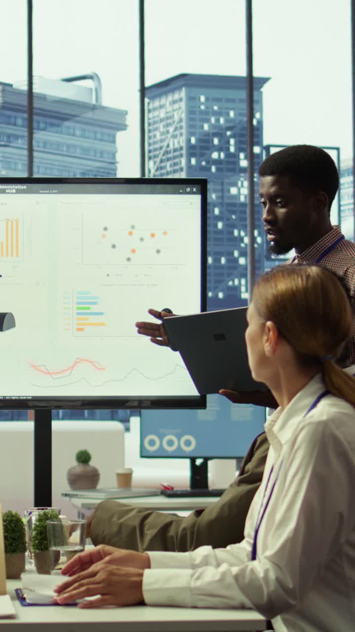 Vertical Video Teammates assembling in a boardroom to go over their analysis results
