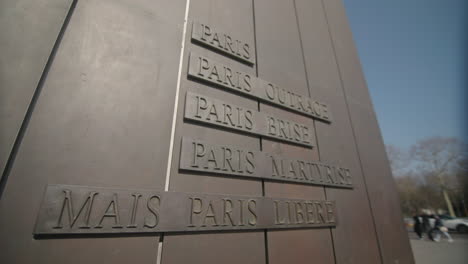 words-written-on-statue-of-general-de-Gaulle-in-front-of-grand-palais-paris-france