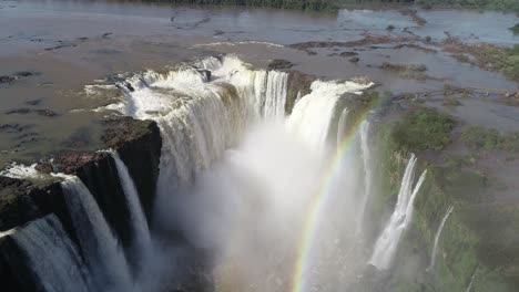 Impressive-drone-view-of-the-'Garganta-del-Diablo'-with-a-vibrant-rainbow