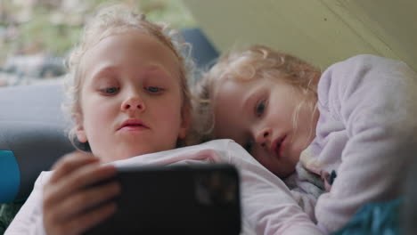 Phone,-bed-and-children-together-for-internet