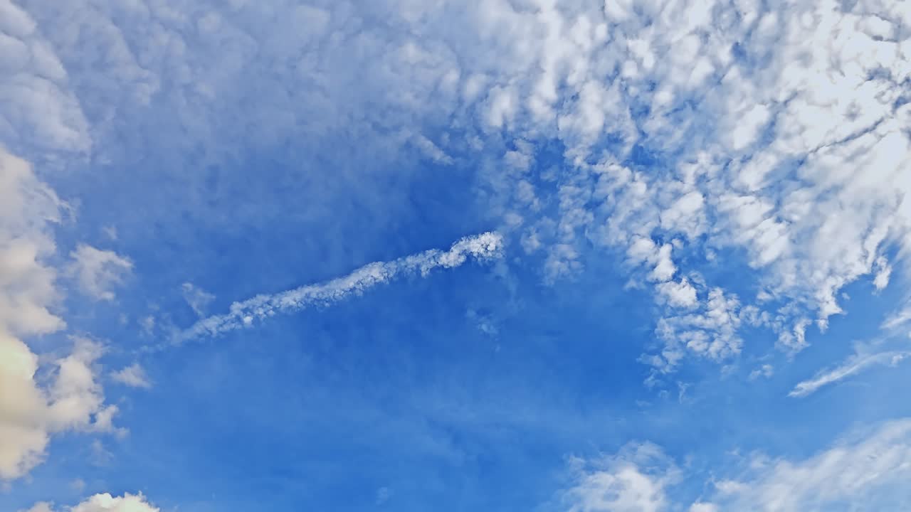 Explore the beauty of cloud formations a serene blue sky capturing nature's artistry
