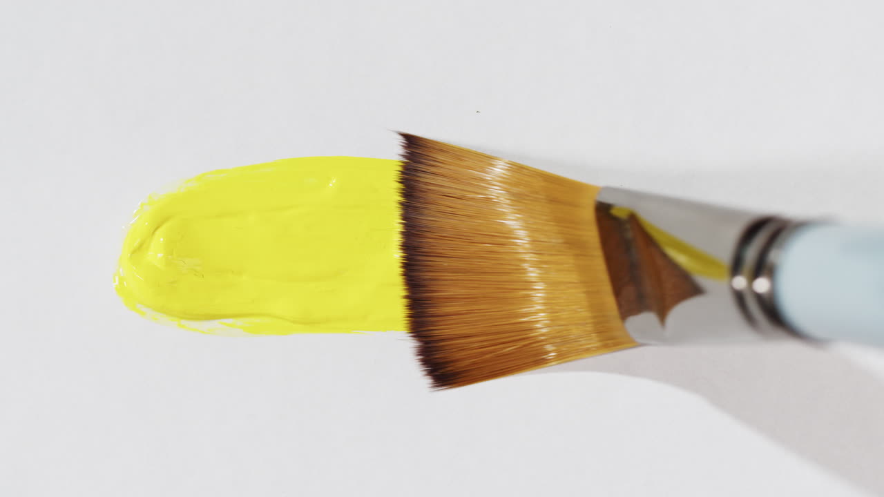 Paint Brush with Yellow Paint
