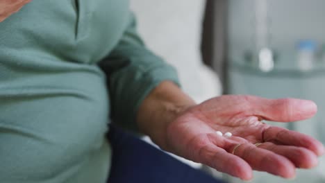 a senior african american woman spending time at home. social distancing in quarantine.