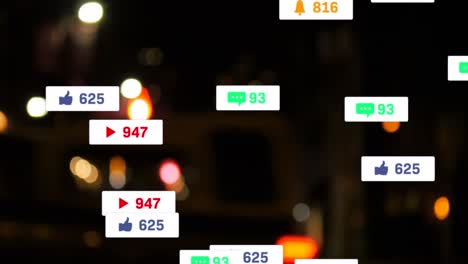 Animation-of-social-media-icons-and-numbers-over-out-of-focus-city-and-traffic-lights