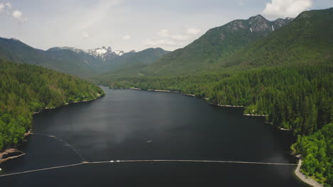 Aerial-drone-view-of-the-breathtaking-mountain-wilderness-around-Lake-Capilano-in-British-Columbia,-Canada