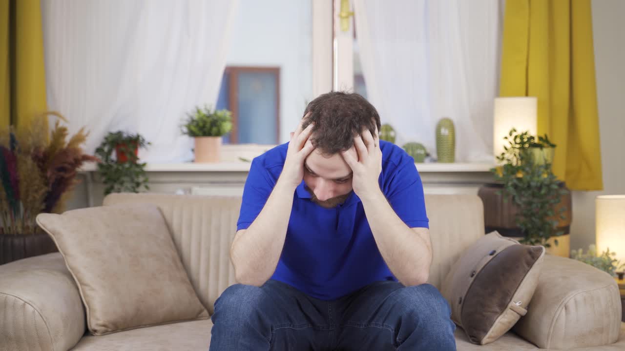 The troubled man is thoughtful, not well off.