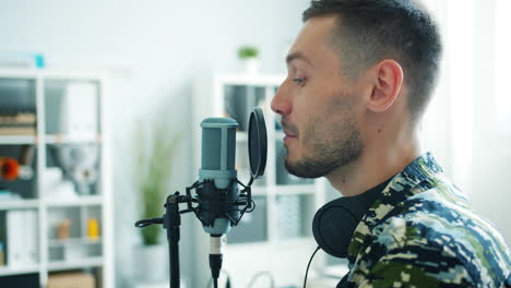 man recording podcast or interview