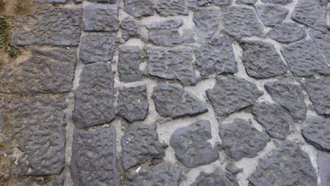 footsteps on ancient stone pavement in naples