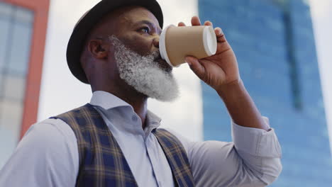 black senior businessman, coffee