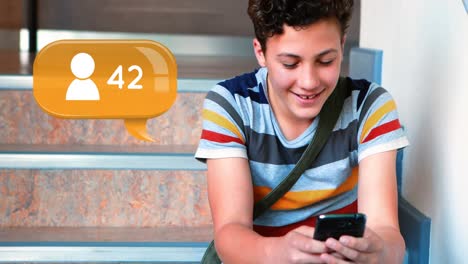 Boy-sitting-on-the-stairs-checking-his-phone-4k