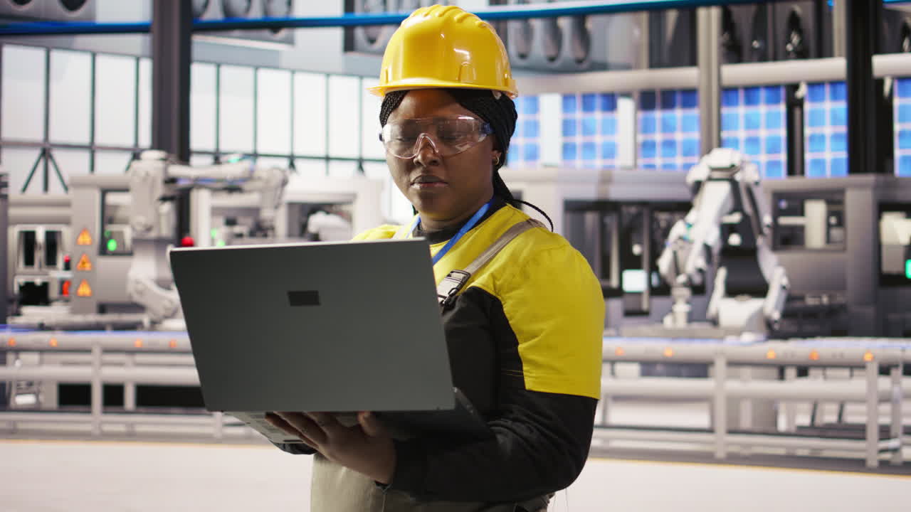 Vertical video Solar panels factory engineer analyzing data from IoT sensors