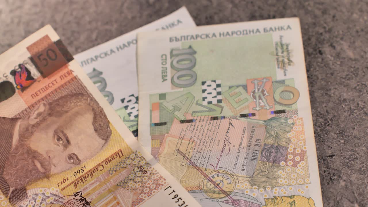 Bulgaria change currency, Bulgaria Lev to Euro. Money exchange. Paper banknotes on table. Concept, economy, competition, crisis, banking and finance. BGN,BGL. Scene W. Close up slide shot
