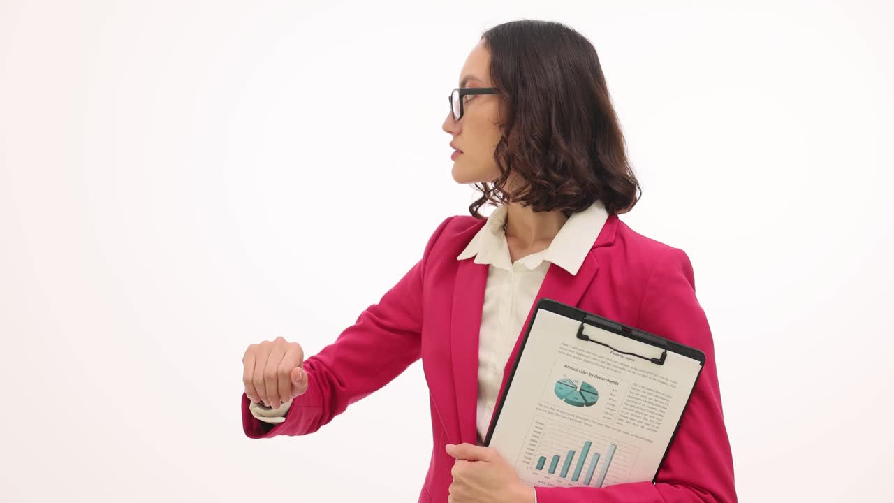 Professional Businesswoman Checking Her Watch While Holding a Business Report