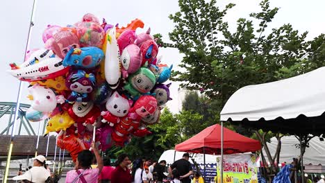 colorful balloons attract visitors at bangkok market