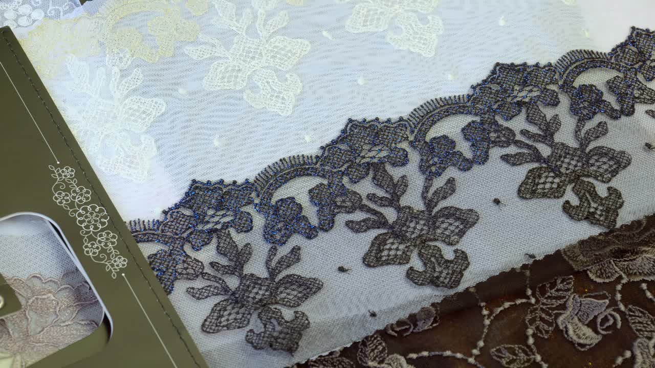 Delicate lace textiles and vibrant patterns create a creative textile mood