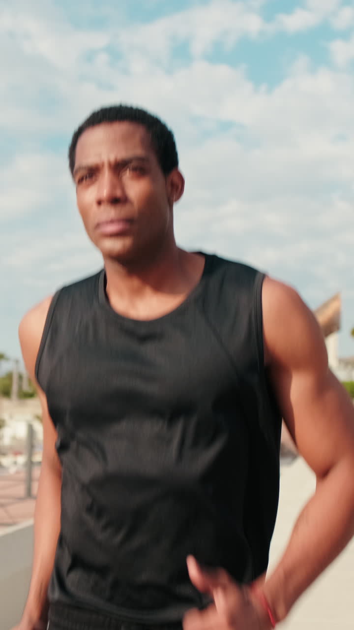 Man Jogging in the City on a Sunny Day