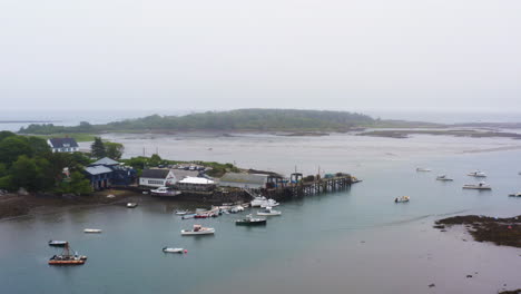 drone-aerial-of-fishing-and-lobster-boats-sitting-in-marina-4k-30p