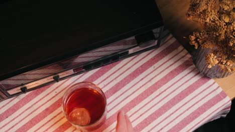 vintage radio, tea, and dried flowers