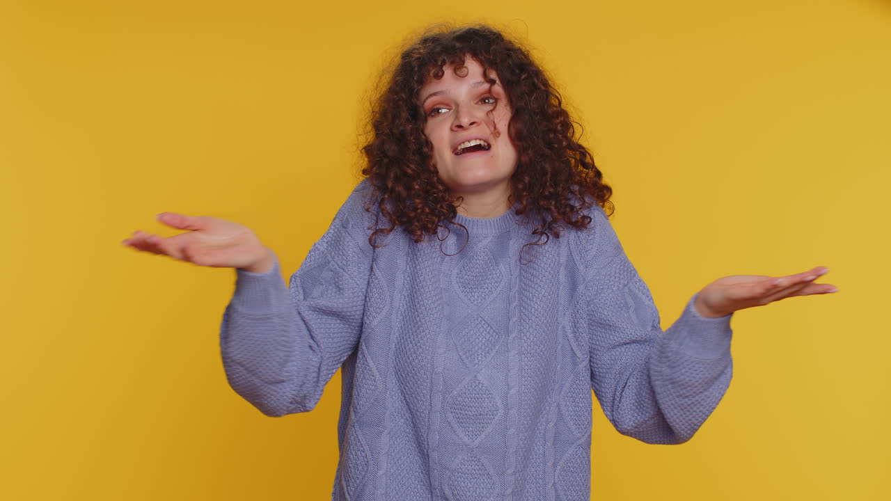 Confused woman feeling embarrassed about ambiguous question having doubts no idea clueless uncertain