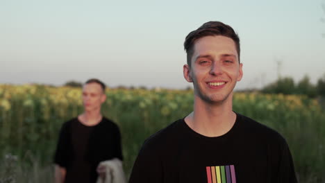 man looking at horizon and smiling