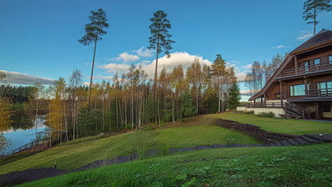 Holiday-Cabin-House-On-Lakeside-Hill-With-Amazing-Nature-Scenery-On-A-Sunny-Day