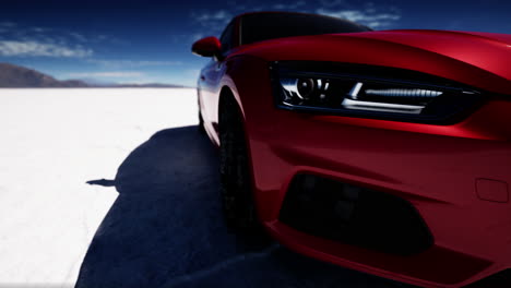 close-up shot of a red car's headlight