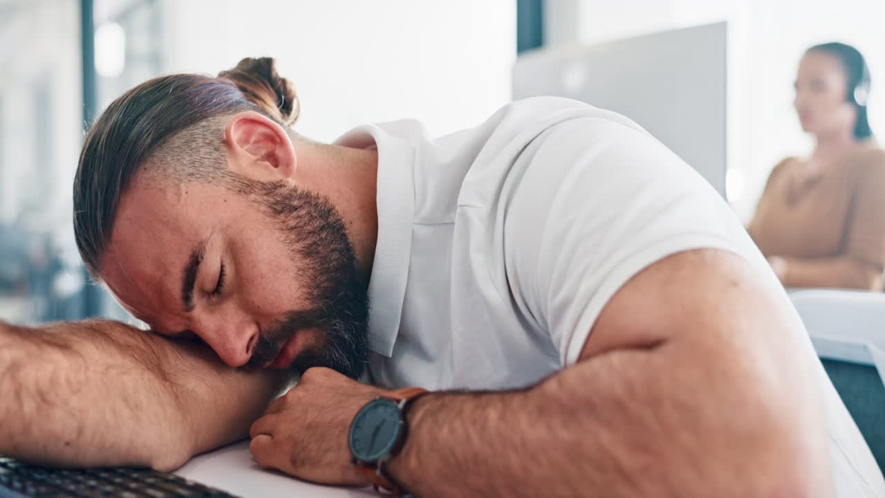 Business man sleeping on desk, tired and insomnia
