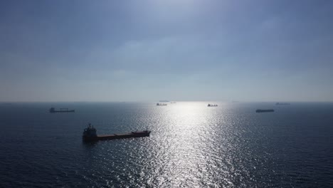 ships at sea on a sunny day