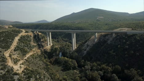 wide aerial shot of a bridge in bosnia and herzegovina