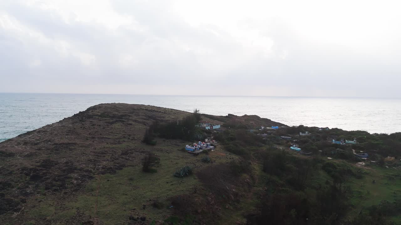Aerial View Orbit of the Village on the Mountain in Bãi TắM Hòn Choi.