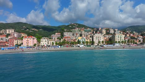 Italian-beachfront-town-of-Varazze-in-Italy,-Aerial-drone-sideways