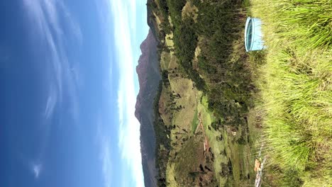 Huts-in-the-forest-land,-green-environment,-forest-view-taken-from-the-top-of-the-mountain