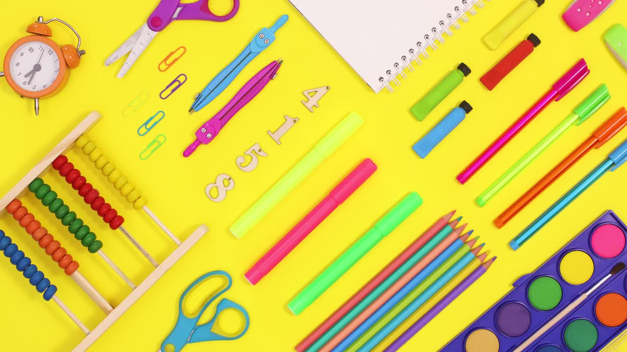 Back to school creative pattern with moving school stationery on yellow theme. Stop motion