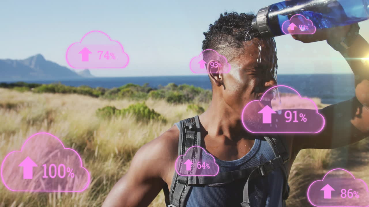 Pouring water over himself, man with animation cloud icons showing percentages