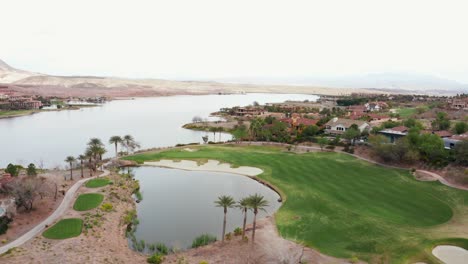 lake las vegas golf course surrounded by houses during overcast day