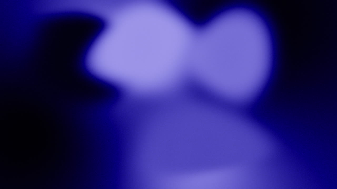 animación de gradiente de fondo abstracto de grano de película azul en un bucle perfecto sin costuras