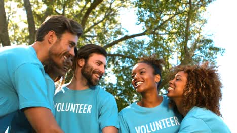 group of volunteer forming hands stack