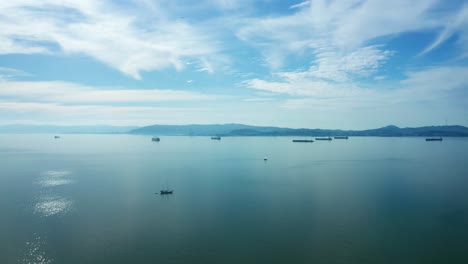 Stark-blue-skies-over-the-glassy-bay-waters-on-a-sunny-day