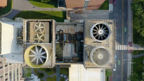 top down aerial view of commercial hvac system on rooftop in summer