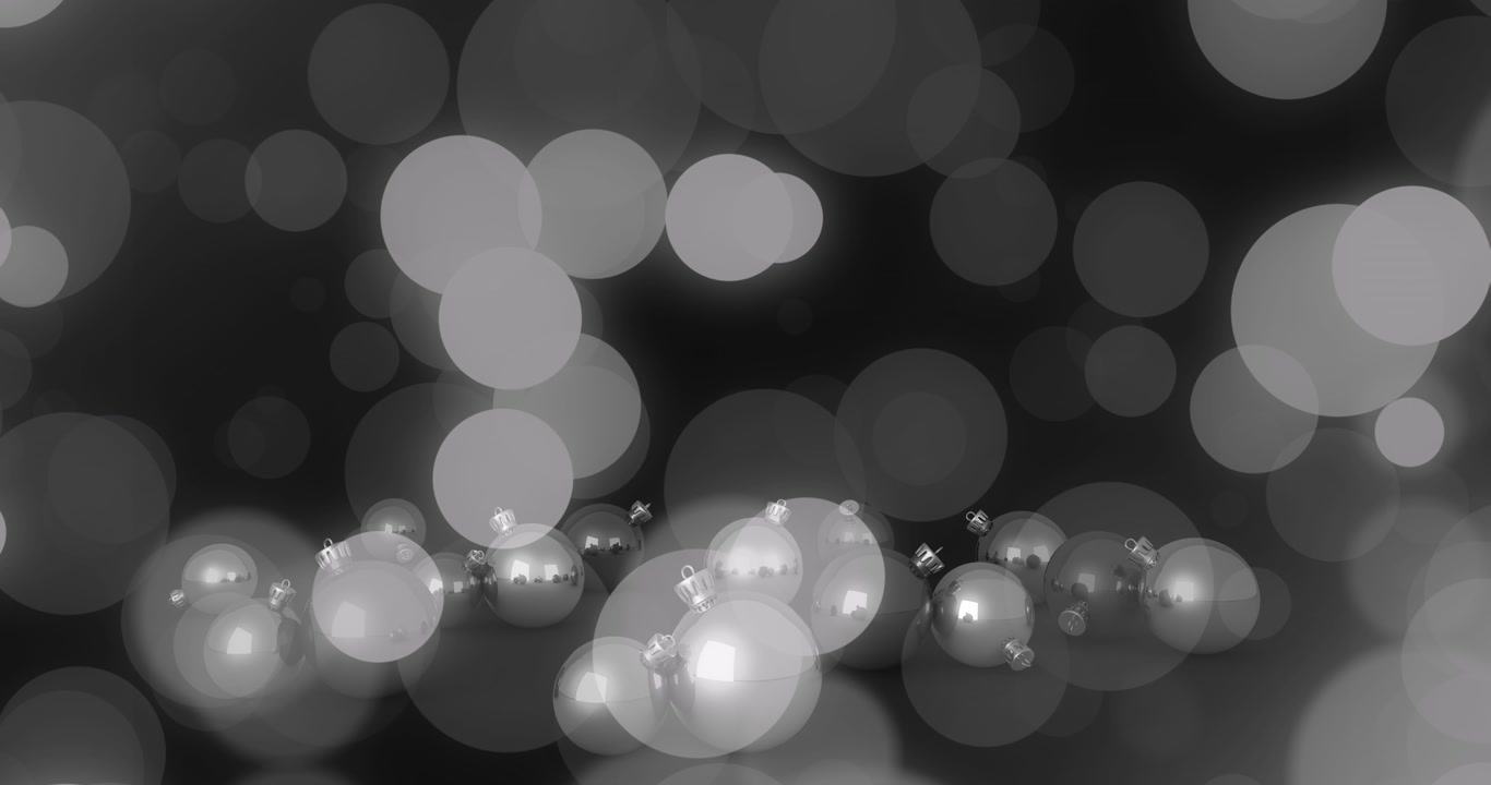 Animation of christmas tree and gold baubles with processing dots on out of focus background