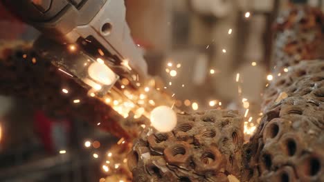 slow motion dynamic industrial metal cutting with vibrant sparks flying