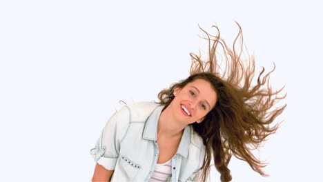 smiling woman shaking hair