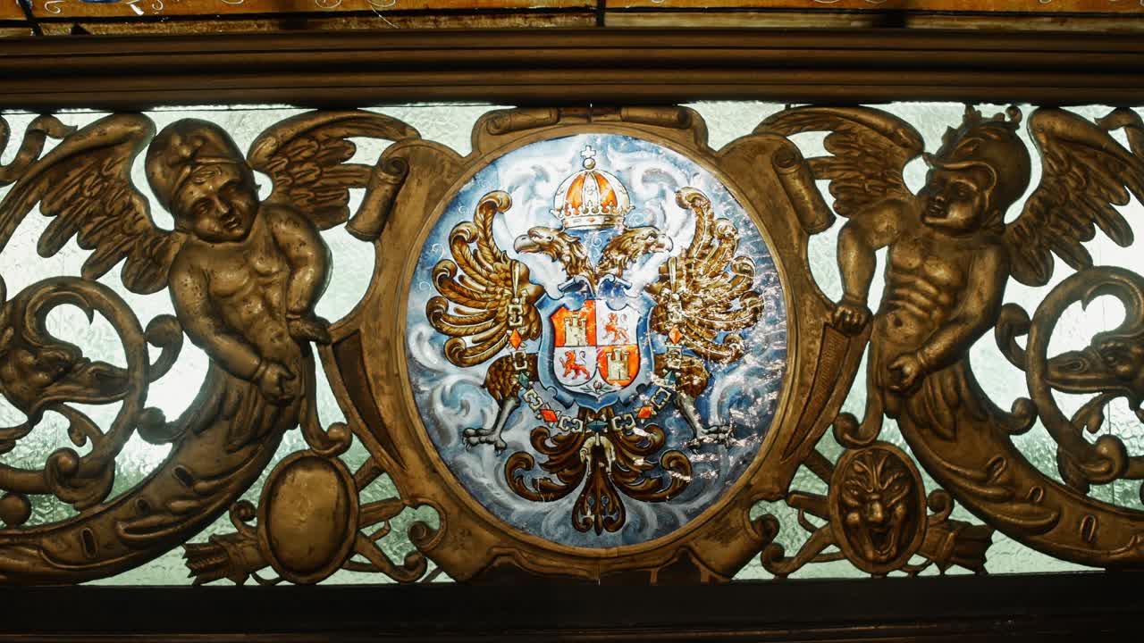 Close up of altar inside la almudena cathedral in madrid. Shield on metal fence