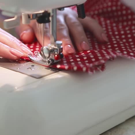 home craft. woman is sewing